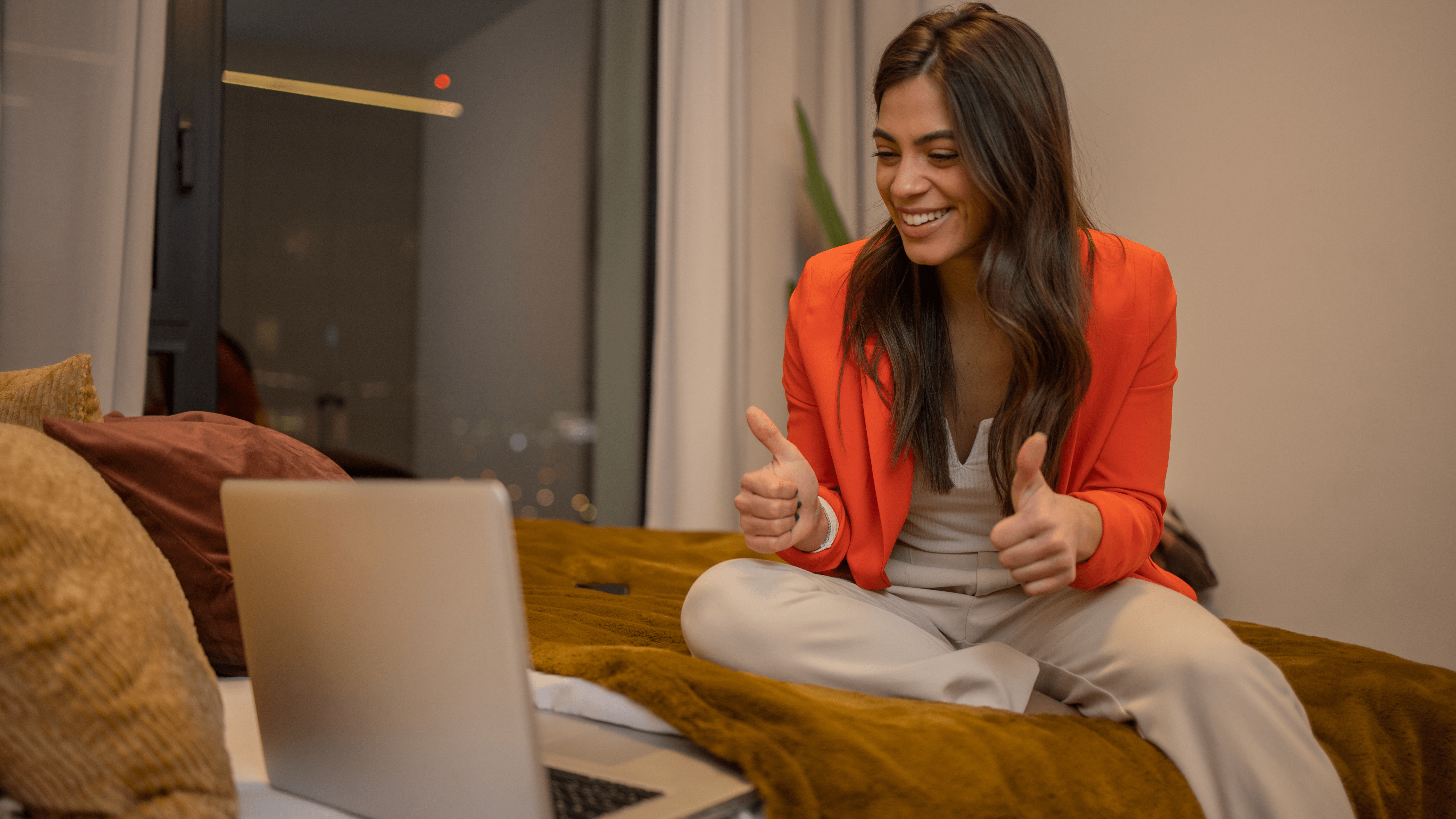 A woman working from home at a serviced apartment