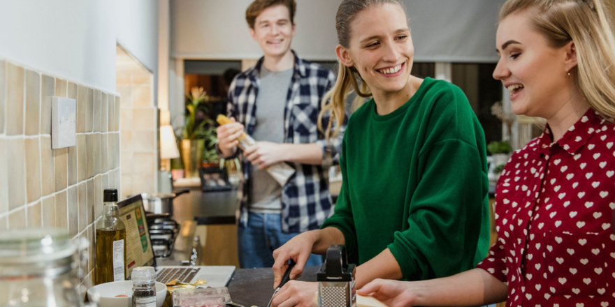 Students making food at home saving money